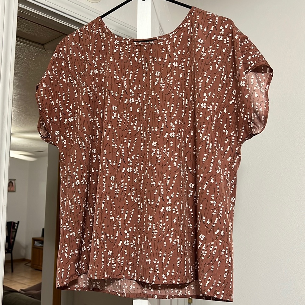 New floral shirt.